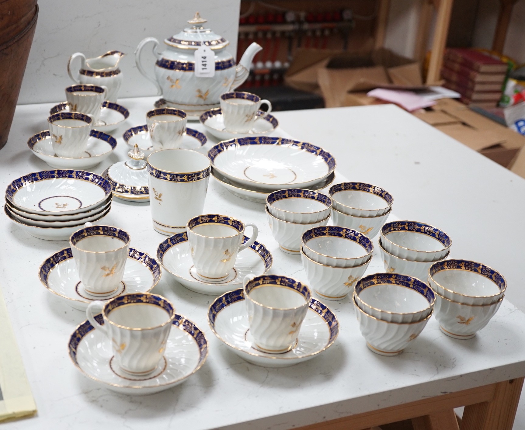 A Flight and Barr, Worcester blue and gilt bordered part tea and coffee service, c.1795, incised B marks